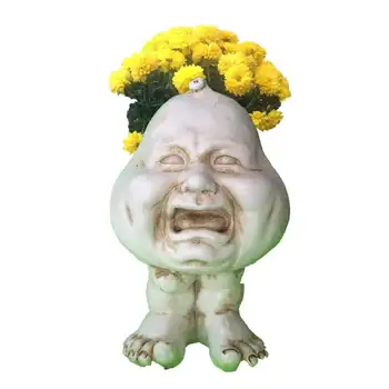 Белый плачущий горшок с юмористической статуей в виде плащущего лица
